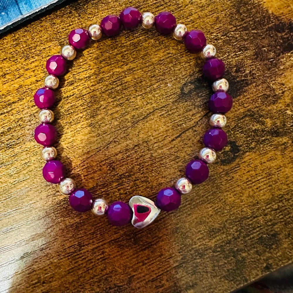 Rose gold and purple bracelet with metal heart
